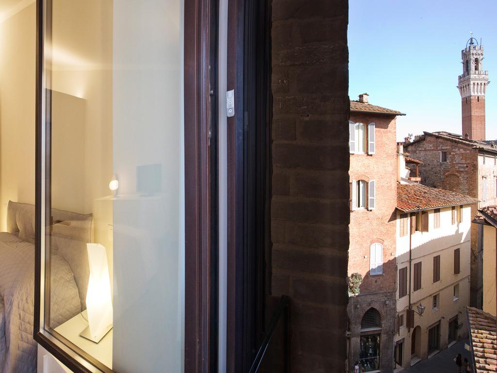 Il Tolomei - Central In The Middle Of Main Street Siena Room photo